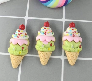 Detailed close-up of resin ice cream cone charms for DIY phone case and crafts accessories