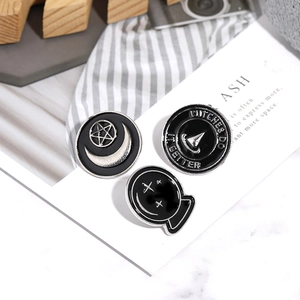 Three-piece punk enamel pin set featuring witch moon and crystal ball designs