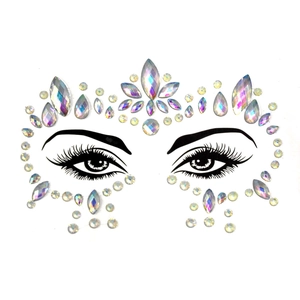 Detailed view of iridescent face gem stickers in various shapes for festive makeup