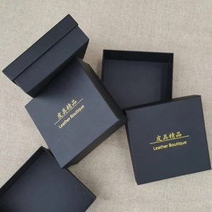 Luxe matte black gift box with gold Leather Boutique stamping for belts and accessories