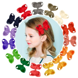 Detailed collection of 4-inch velvet Christmas hair bows in 13 vibrant assorted colors