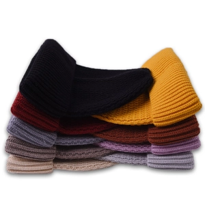 Colorful ribbed knit beanie hats for men and women featuring folded cuffs and vertical stripes