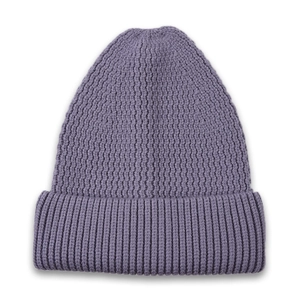 Close-up of lilac purple knit beanie with chunky vertical ribbed texture and folded cuff