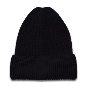 Close-up of black knitted beanie with wide ribbed cuff and minimalist textured pattern