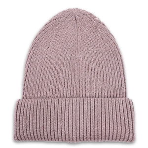 Detail of ribbed knit pattern and wide folded brim on a warm dusty rose beanie hat