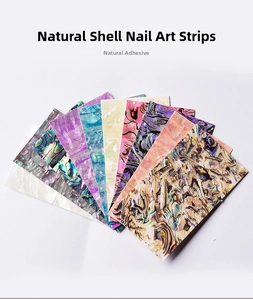 Macro detail of natural thin shell nail stickers with self-adhesive backing in multiple colors