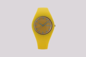 Detailed macro view of yellow silicone strap and brown Geneva watch dial with blue hands