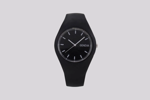 Detail of a black silicone watch strap and round dial with white Geneva logo