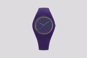 Close-up of Geneva purple silicone strap watch with deep blue dial and linear scale