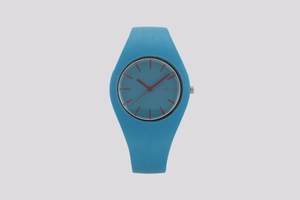 Detail of blue Geneva watch with silicone strap and red hands on a blue dial