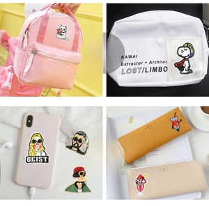 DIY embroidered rose patches displayed on backpacks, canvas bags, and phone cases