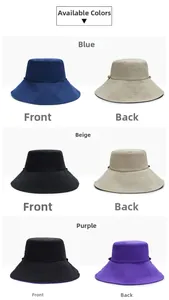 Detail view of double-sided sun hats in blue, beige, and purple cotton fabric