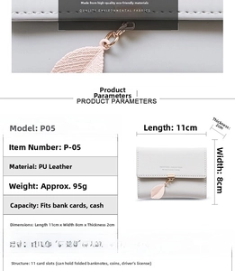 Macro detail of PU leather wallet with a pink leaf pendant and internal card slots