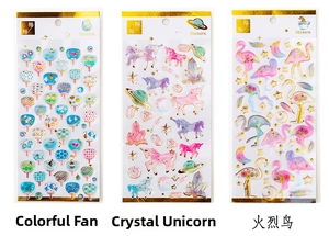 Detail of dreamlike gold-stamped crystal epoxy stickers with unicorn and flamingo designs