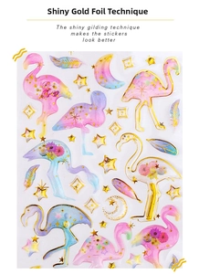 Detail of dreamlike stickers with gilding technique showing flamingos and moon stars