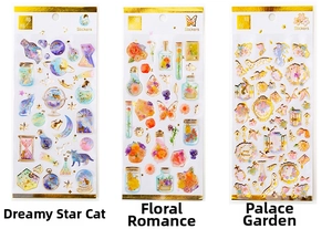 Detail of three bronzing crystal stickers with gold foil frames and floral cat themes