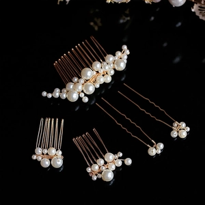 Baroque bridal hair accessories set with white faux pearls and gold wire on black