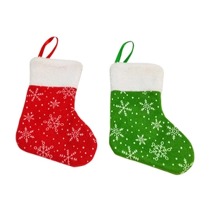 Red and green Christmas snowflake stockings with hanging loops for holiday gift wrapping