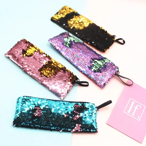 Flippable mermaid sequin pencil cases in four color sets with a zipper and hanging loop