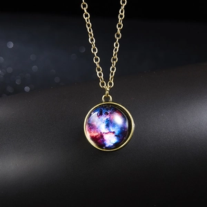Vintage bronze galaxy pendant necklace featuring glowing nebula glass dome and cosmic pattern