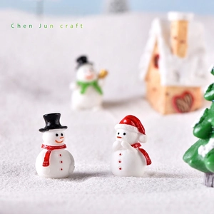 Miniature resin snowmen figurines with red scarves and hats for Christmas decor