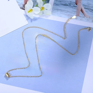 Elegant gold cylinder waist pendant necklace with a fine chain in a minimalist Korean style