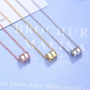 Elegant hourglass cylinder necklaces in rose gold, gold, and silver finishes for women
