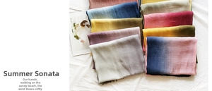 Detailed weave texture of lightweight gradient cotton linen scarves in various colors