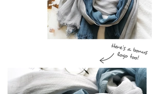Detail of frayed edges and natural cotton-linen texture on a blue and gray scarf