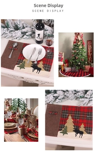 Detailed view of red black plaid Christmas placemat with reindeer embroidery and cutlery pocket