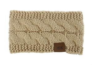 Detail of cable knit khaki headband featuring a premium brown leather brand label