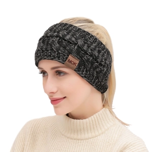 Winter chunky knit headband for women in dark grey mix with leather logo tag