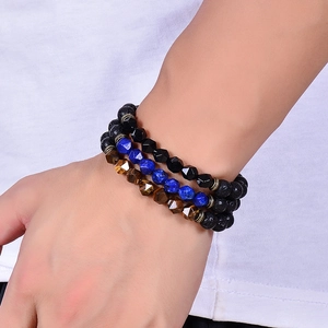Three-layer men's bracelet set with faceted tiger eye, black lava rock, and blue beads