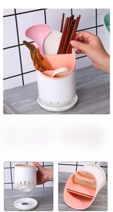 Detail view of the detachable 3-compartment kitchen utensil drainer and drip tray