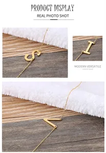 Detailed display of S, I, and V gold letter pendants on polished stainless steel chains