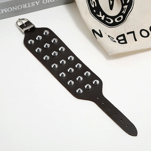 Punk style wide dark brown faux leather bracelet with three rows of silver cone rivets