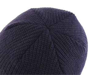 Detailed knit texture and crown stitching on a navy blue winter beanie hat