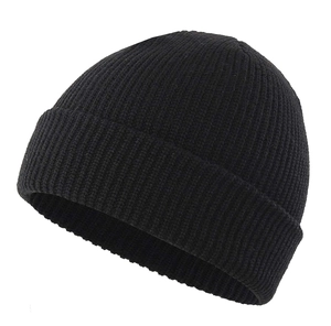 Detail of black ribbed knit beanie showing high-quality vertical weave and wide folded cuff