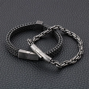 Retro stainless steel woven bracelets in silver and grey finish on black leather