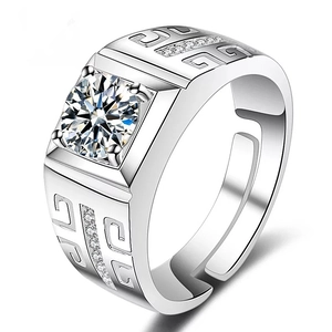 Macro detail of men's square zircon ring with geometric Greek key relief pattern