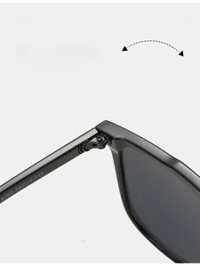Macro shot of durable metal hinges and size specs on square double-bridge sunglasses