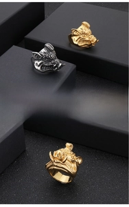 Detailed relief of wild boar head rings in antique silver and gold stainless steel