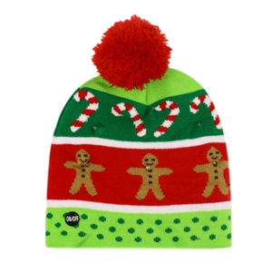 Close-up of the ON/OFF power button on a festive LED knitted Christmas beanie hat