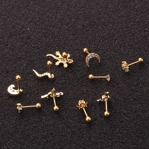 Set di 10 orecchini in acciaio inossidabile dorato con forme luna stella e zirconi