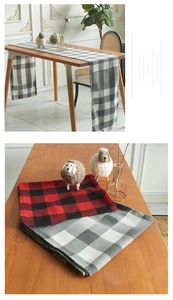 Detailed macro view of classic buffalo check cotton linen table runner in various colors