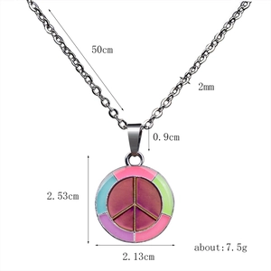 Detailed view of color-changing peace sign pendant necklace with dimension markings