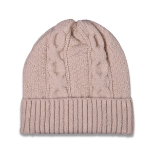 Close-up of cable knit texture and ribbed cuff on a soft light pink winter beanie