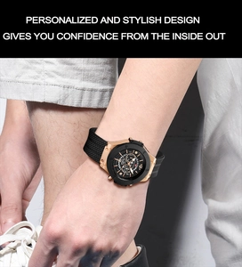 Men's sport watch with rose gold case and black rubber strap worn in a lifestyle scene