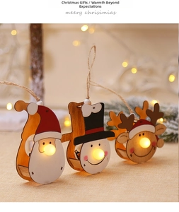 Macro shot of illuminated wooden Christmas ornaments with warm LED lights and twine