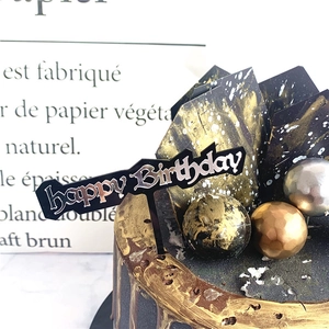 Black gold happy birthday cake topper set with geometric fans and metallic decorative balls.